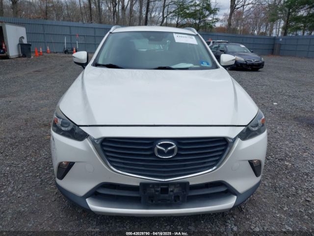 JM1DKFC71J0315074 Mazda Cx-3 Touring