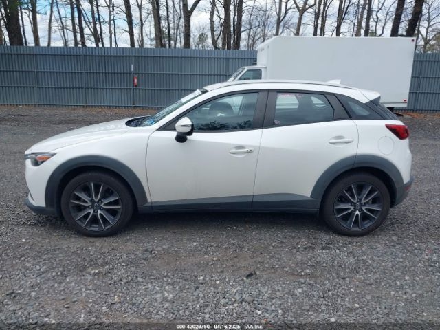 JM1DKFC71J0315074 Mazda Cx-3 Touring