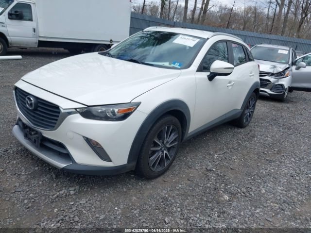 JM1DKFC71J0315074 Mazda Cx-3 Touring
