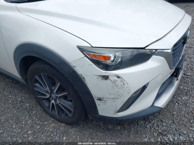 JM1DKFC71J0315074 Mazda Cx-3 Touring