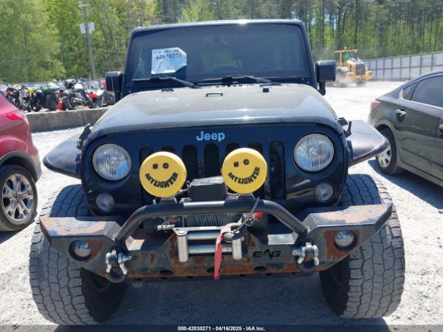 1C4BJWEGXEL317725 Jeep Wrangler Unlimited Sahara