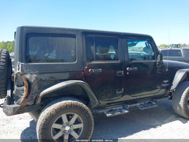 1C4BJWEGXEL317725 Jeep Wrangler Unlimited Sahara