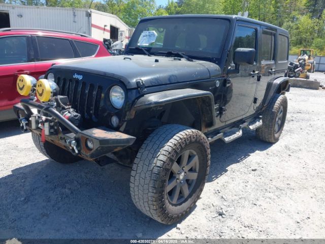 1C4BJWEGXEL317725 Jeep Wrangler Unlimited Sahara