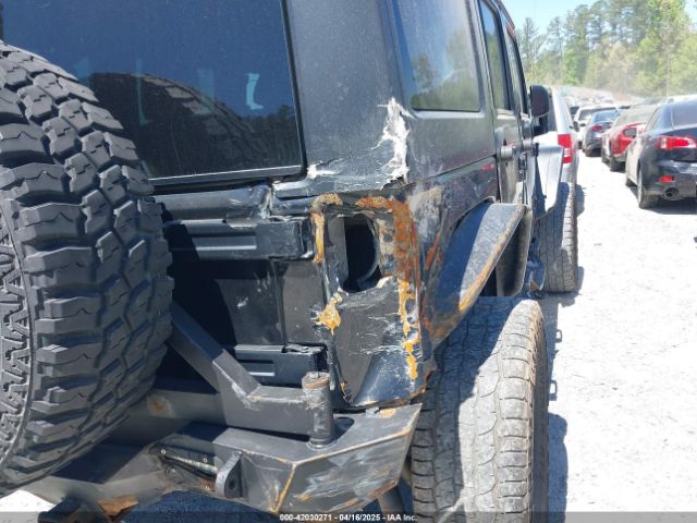 1C4BJWEGXEL317725 Jeep Wrangler Unlimited Sahara