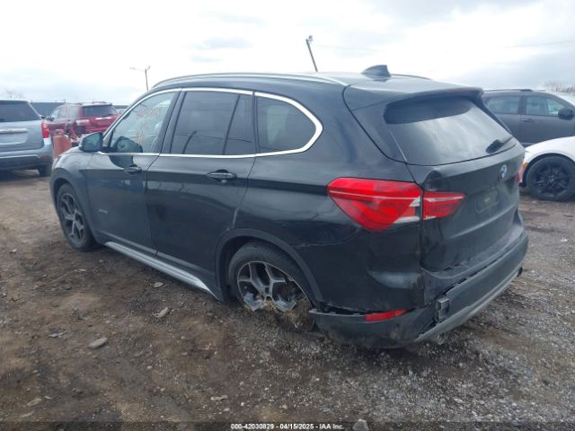 2018 BMW X1 WBXHT3Z36J4A66772 Photo 2