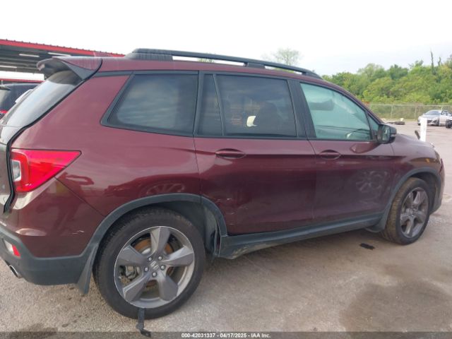 5FNYF7H97MB002123 Honda Passport 2wd Touring