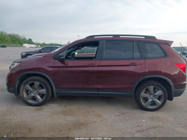 5FNYF7H97MB002123 Honda Passport 2wd Touring