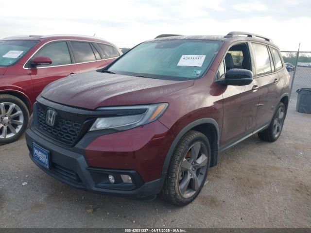 5FNYF7H97MB002123 Honda Passport 2wd Touring