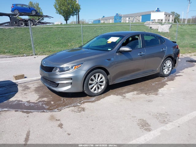 5XXGT4L31GG044018 KIA Optima Lx