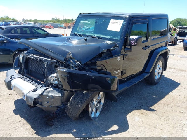 1C4GJWBG9FL540558 Jeep Wrangler Sahara