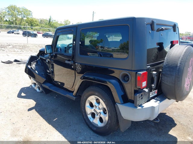 1C4GJWBG9FL540558 Jeep Wrangler Sahara
