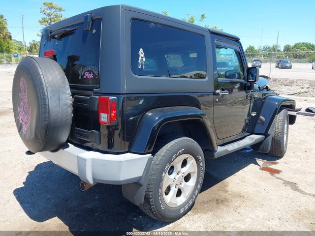 1C4GJWBG9FL540558 Jeep Wrangler Sahara