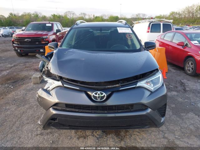 JTMBFREV1GD187414 Toyota RAV4 LE
