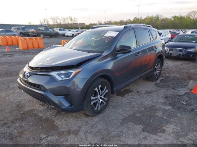 JTMBFREV1GD187414 Toyota RAV4 LE