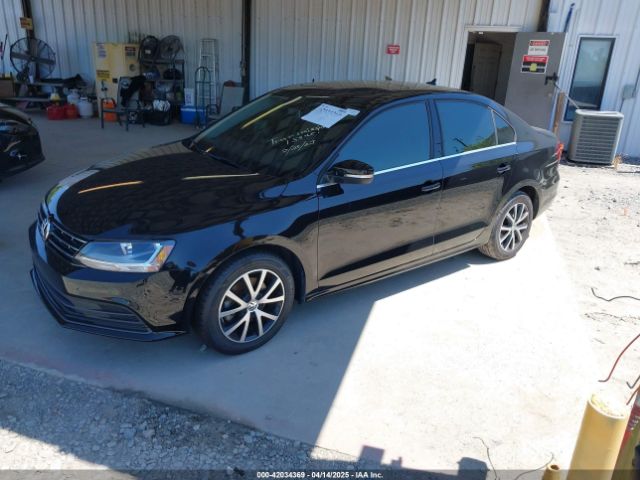 3VWDB7AJ5JM261387 Volkswagen Jetta 1.4t Se/1.4t Wolfsburg Edition
