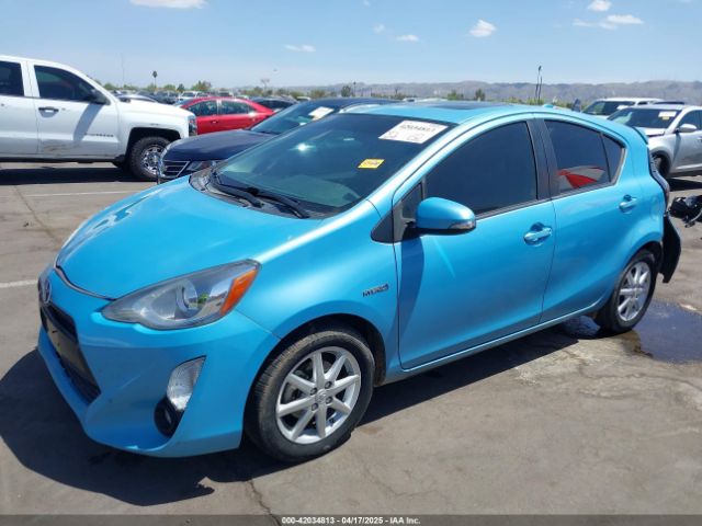 JTDKDTB30F1100821 Toyota Prius C Four