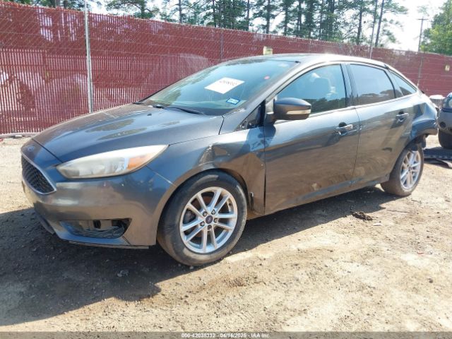 2016 FORD FOCUS 1FADP3F22GL208595 Photo 1