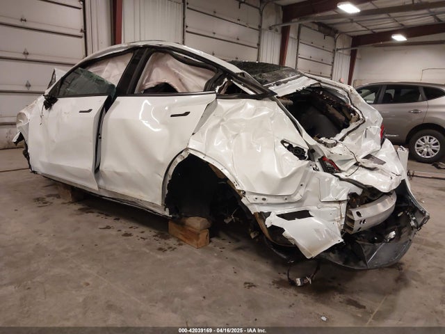 2021 TESLA MODEL Y 5YJYGDEF4MF075584 Photo 2