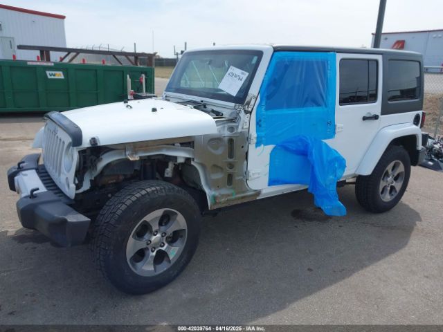 1C4BJWEG5GL330918 Jeep Wrangler Unlimited Sahara