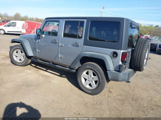 1C4BJWDG9FL722218 Jeep Wrangler Unlimited Sport