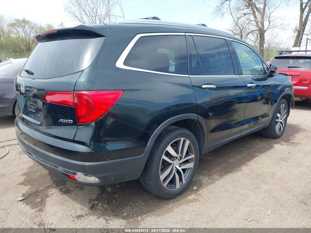 5FNYF6H06JB037002 Honda Pilot Elite