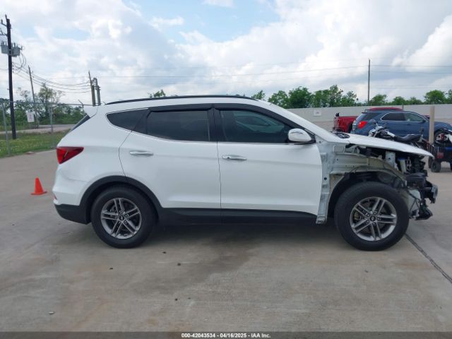 5NMZU3LB2HH028050 Hyundai Santa Fe Sport 2.4l