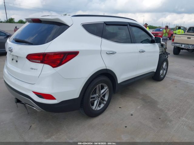 5NMZU3LB2HH028050 Hyundai Santa Fe Sport 2.4l