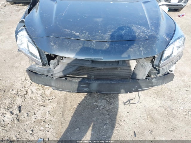 1G11B5SLXEF208208 Chevrolet Malibu 1ls