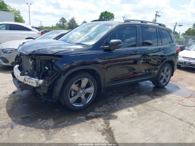 5FNYF7H90LB000700 Honda Passport 2wd Touring
