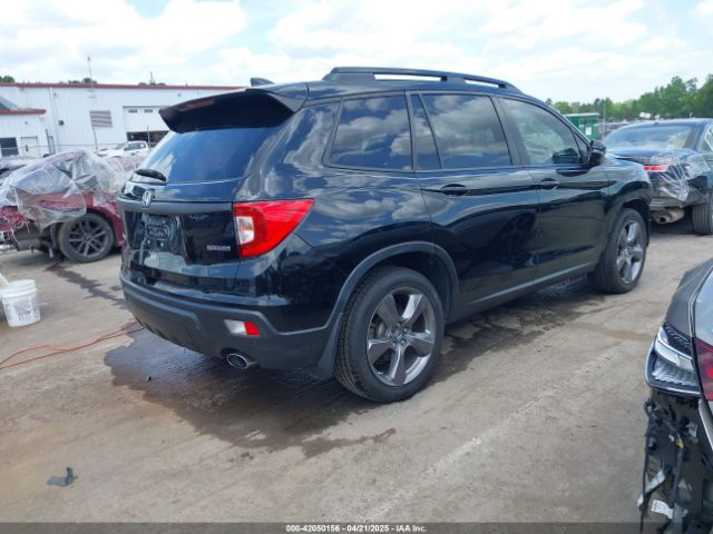 5FNYF7H90LB000700 Honda Passport 2wd Touring