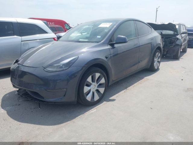 2023 TESLA MODEL Y 7SAYGDEE6PA169168 Photo 1