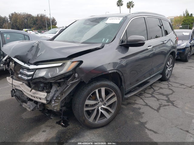 5FNYF5H99GB004142 Honda Pilot Touring