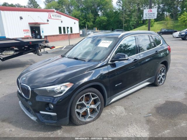 2018 BMW X1 WBXHU7C38J5H44770 Photo 1