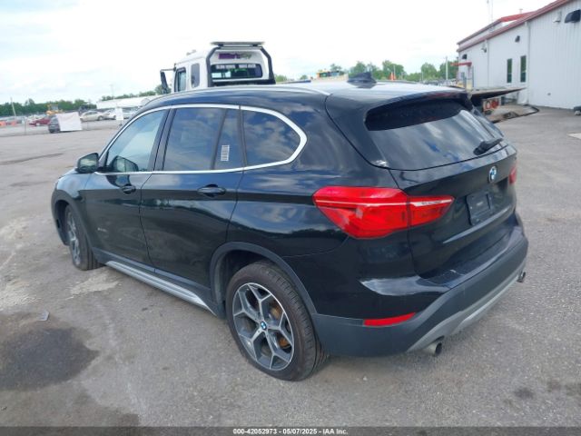 2018 BMW X1 WBXHU7C38J5H44770 Photo 2