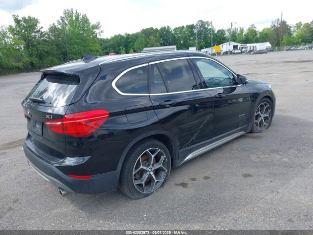 2018 BMW X1 WBXHU7C38J5H44770 Photo 3