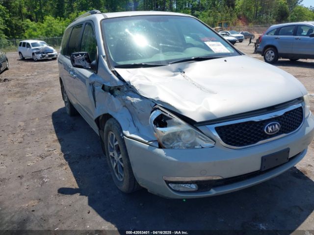 KNDMH4C70E6568392 KIA Sedona