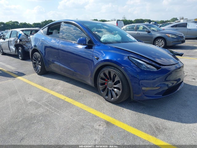 2024 TESLA MODEL Y 7SAYGDEF9RA267204 Photo 0