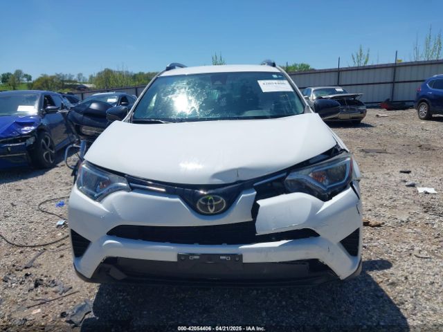 JTMZFREV6JJ730201 Toyota RAV4 LE