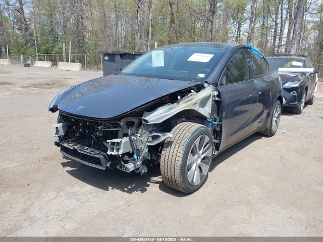 2023 TESLA MODEL Y 7SAYGDEE0PF977874 Photo 1