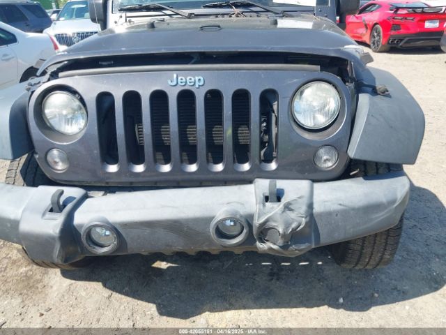1C4AJWAG0EL295817 Jeep Wrangler Sport