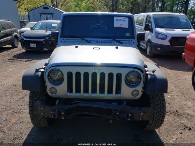 1C4HJWDG6EL310007 Jeep Wrangler Unlimited Sport