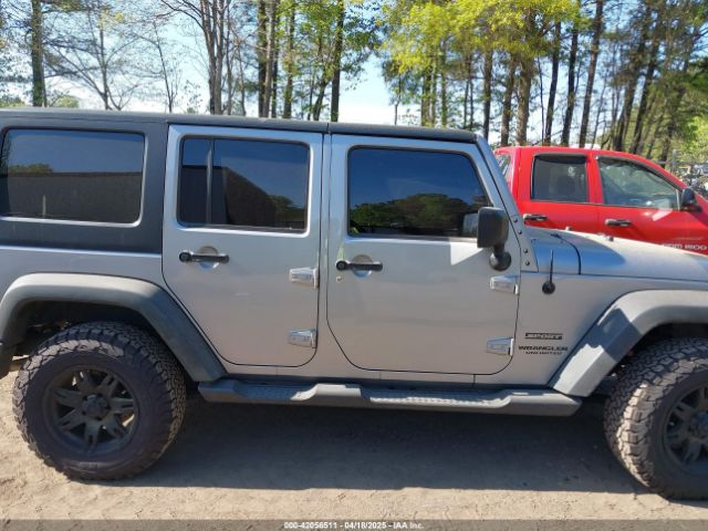 1C4HJWDG6EL310007 Jeep Wrangler Unlimited Sport