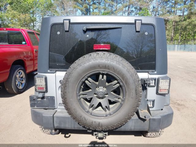 1C4HJWDG6EL310007 Jeep Wrangler Unlimited Sport