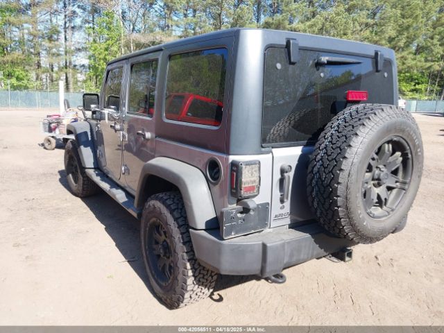 1C4HJWDG6EL310007 Jeep Wrangler Unlimited Sport
