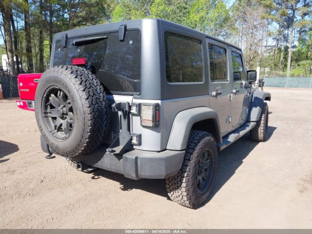 1C4HJWDG6EL310007 Jeep Wrangler Unlimited Sport