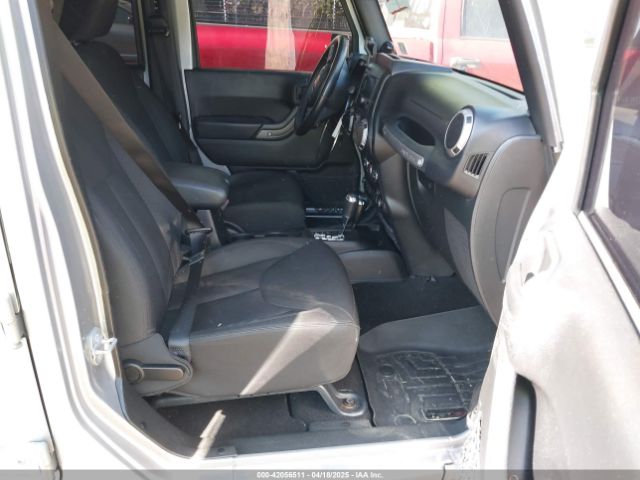 1C4HJWDG6EL310007 Jeep Wrangler Unlimited Sport