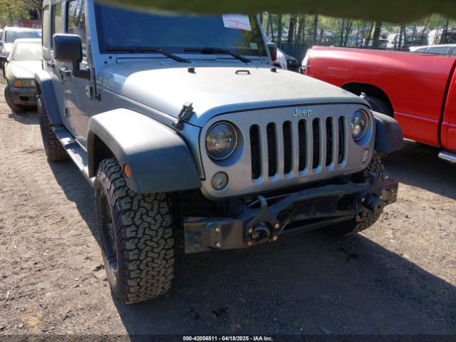 1C4HJWDG6EL310007 Jeep Wrangler Unlimited Sport