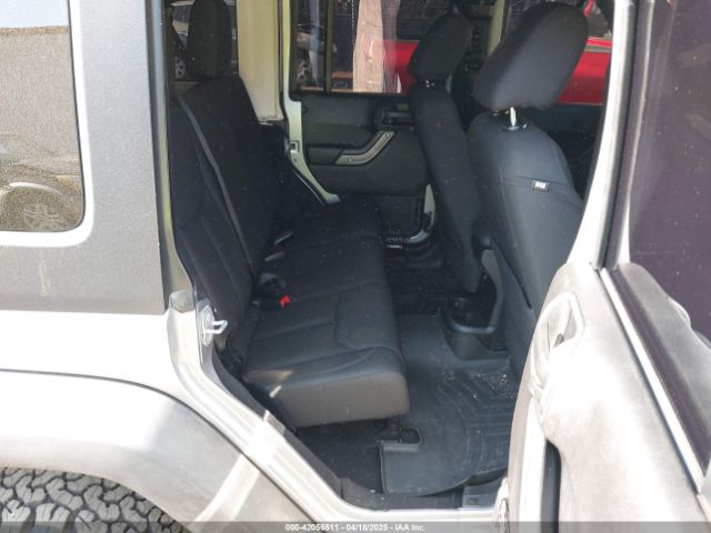 1C4HJWDG6EL310007 Jeep Wrangler Unlimited Sport