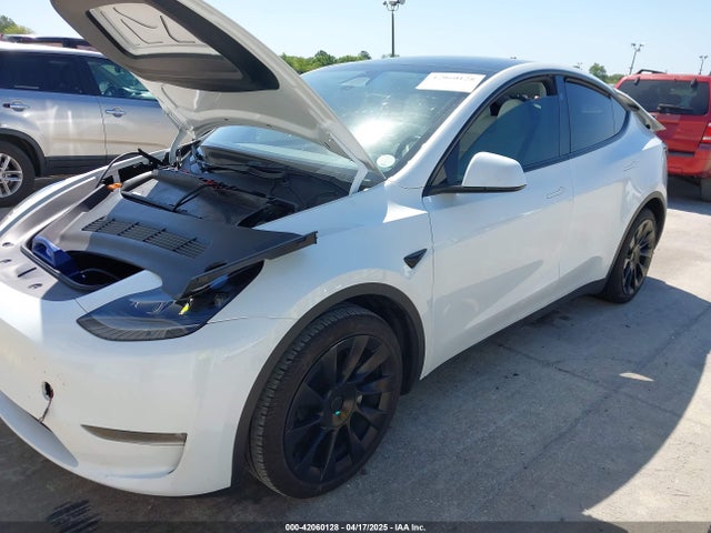 2023 TESLA MODEL Y 7SAYGAEEXPF800974 Photo 1