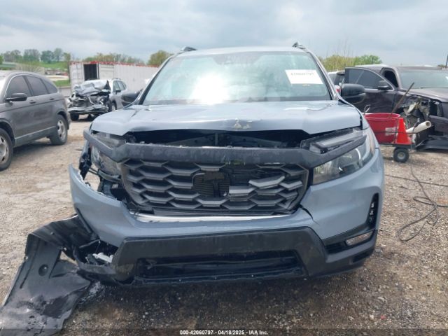 5FNYF8H69SB012063 Honda Passport Awd Trailsport